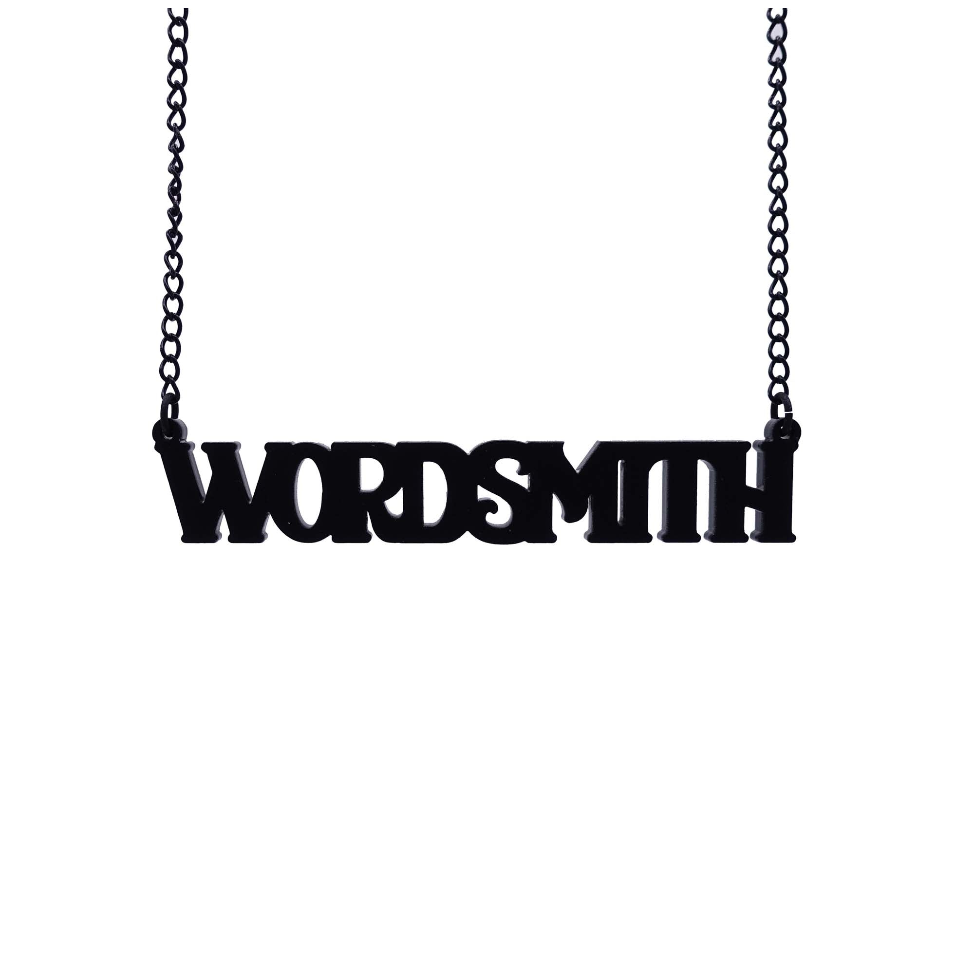 A necklace that says 'Wordsmith' in matte black, shown hanging against a white background.