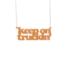 Keep on Truckin' necklace in orange sherbet.