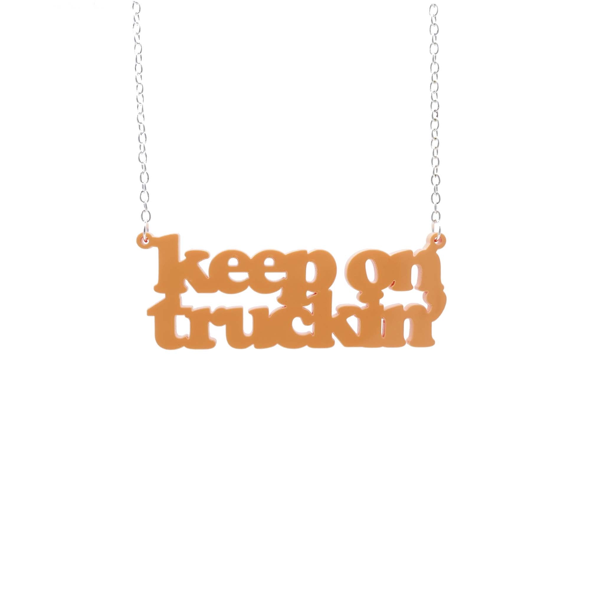 orange sherbet Keep on Truckin' necklace hanging