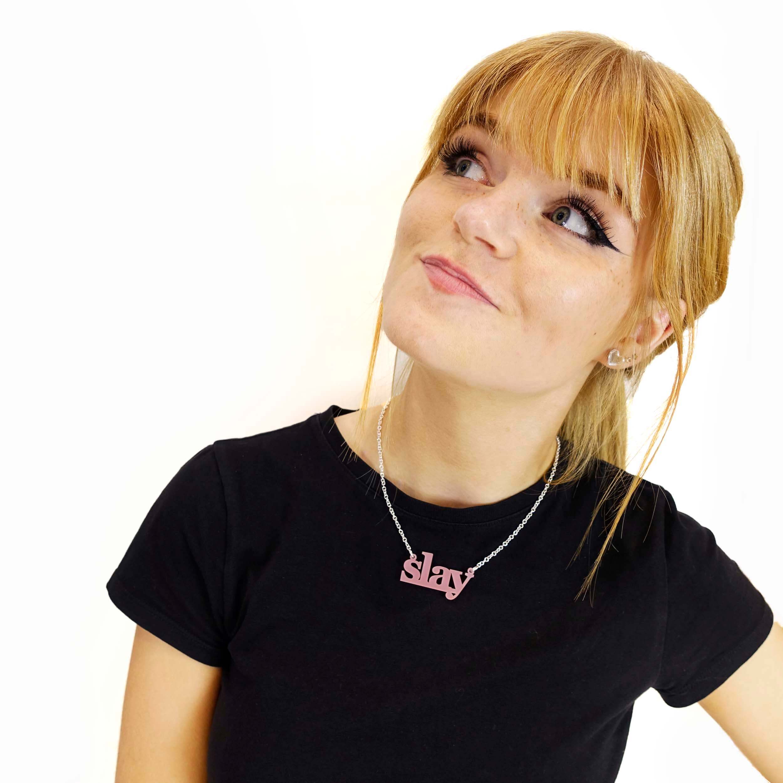 Eliza slays in a blush frost Slay necklace designed by Sarah Day for Wear and Resist.