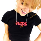 Eliza wears a hot pink and red Splendid necklace.
