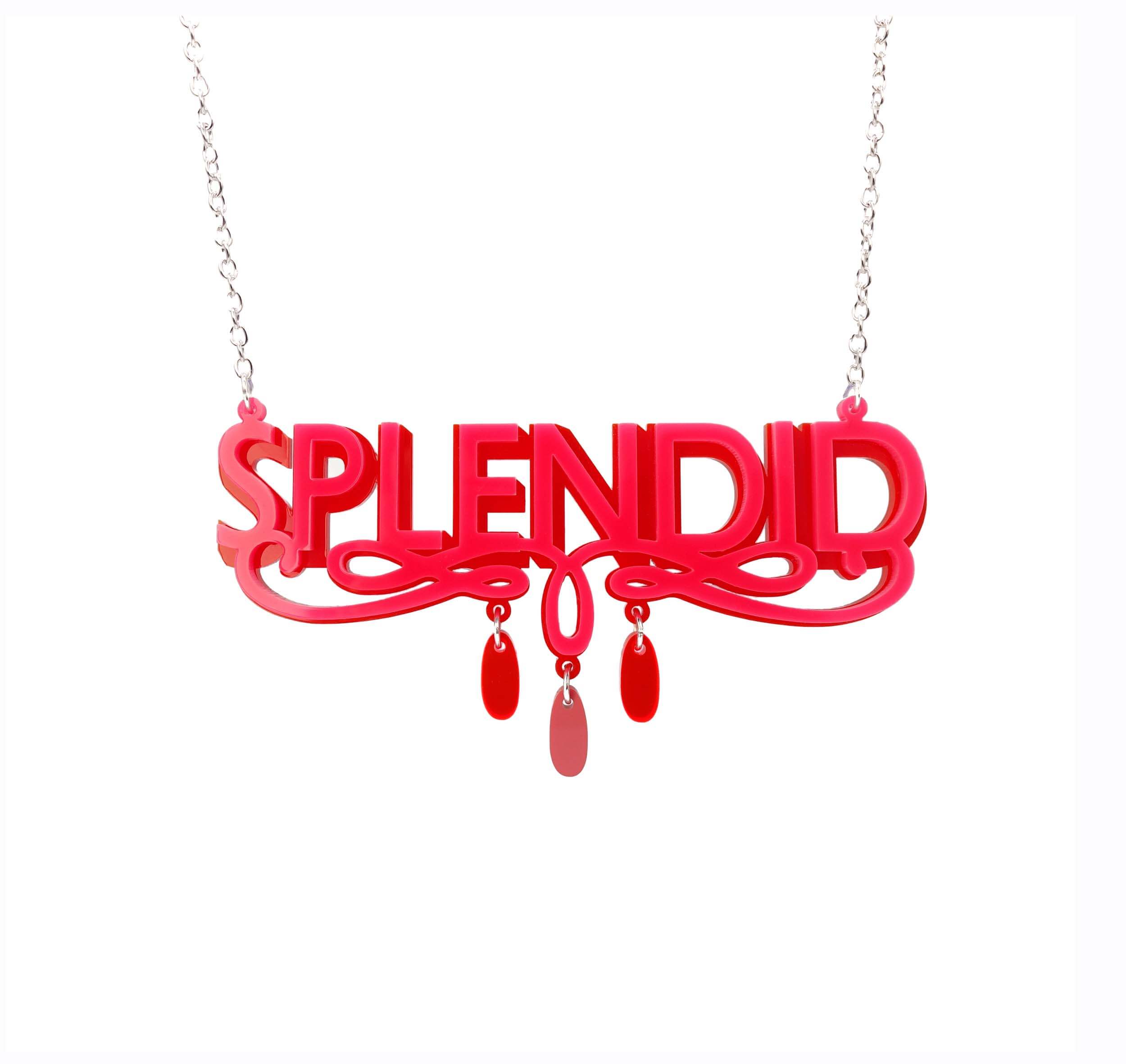 Hot pink and red Splendid necklace shown hanging against a white background.