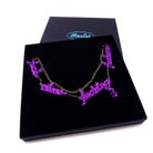 F*ck these F*cking F*ckers   necklace in purple mirror, shown in large Wear and Resist gift box.