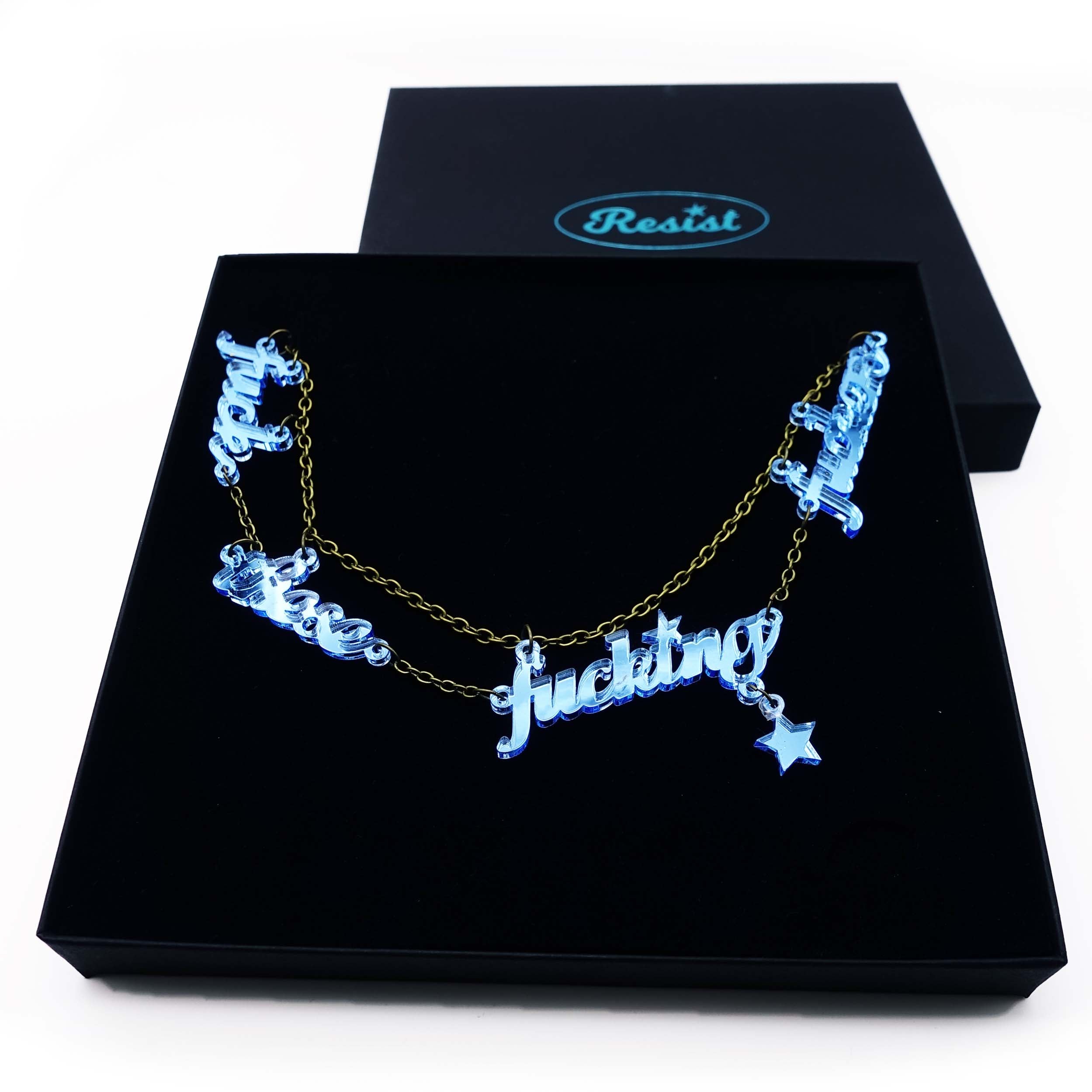 F*ck these F*cking F*ckers   necklace in sky mirror, shown in large Wear and Resist gift box.