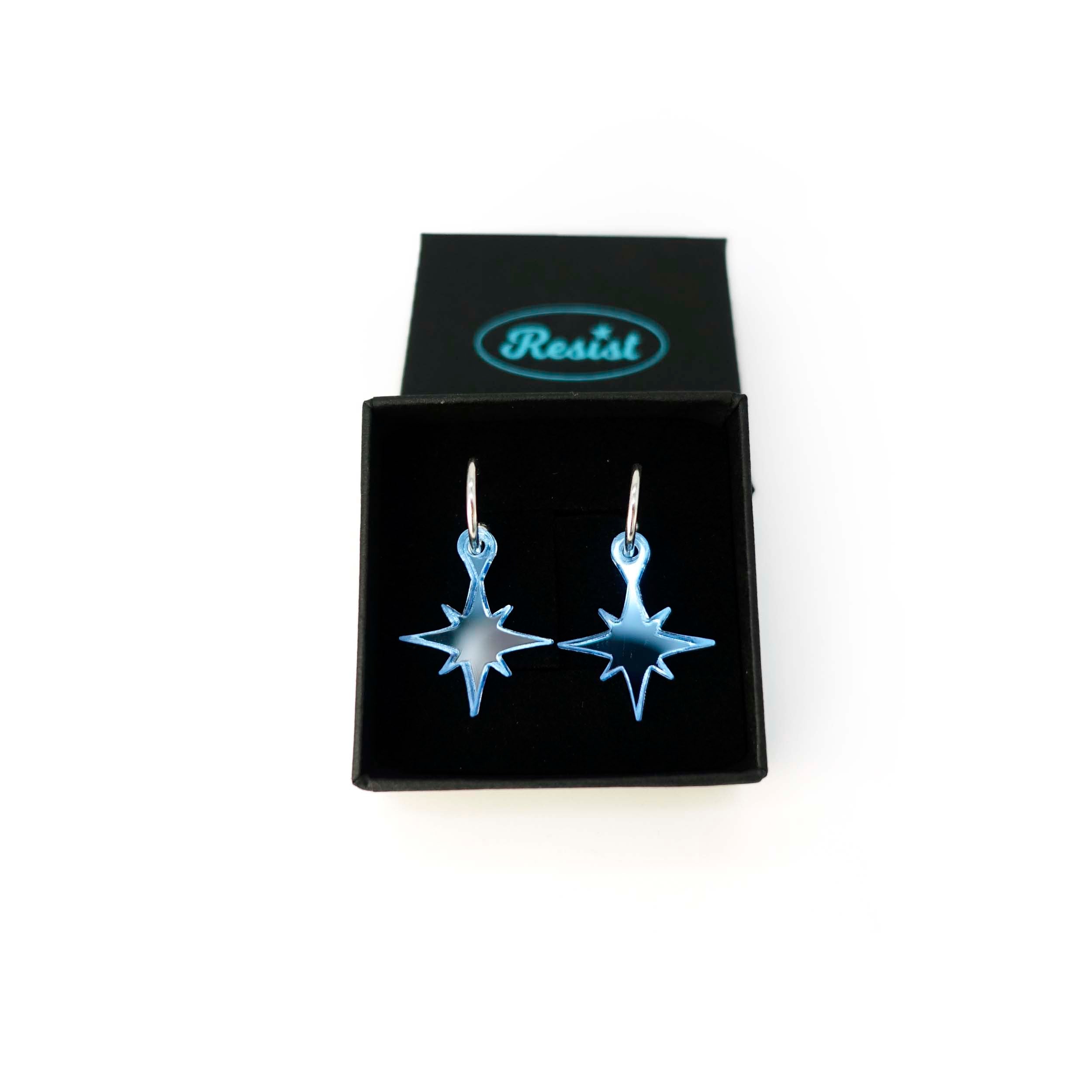 Sky mirror vintage star earrings shown in a Wear and Resist gift box.