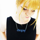 Eliza wears a Welsh slate Chopsy necklace, designed by Sarah Day for Wear and Resist.