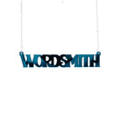 A necklace that says 'Wordsmith' in teal mirror, shown hanging against a white background.