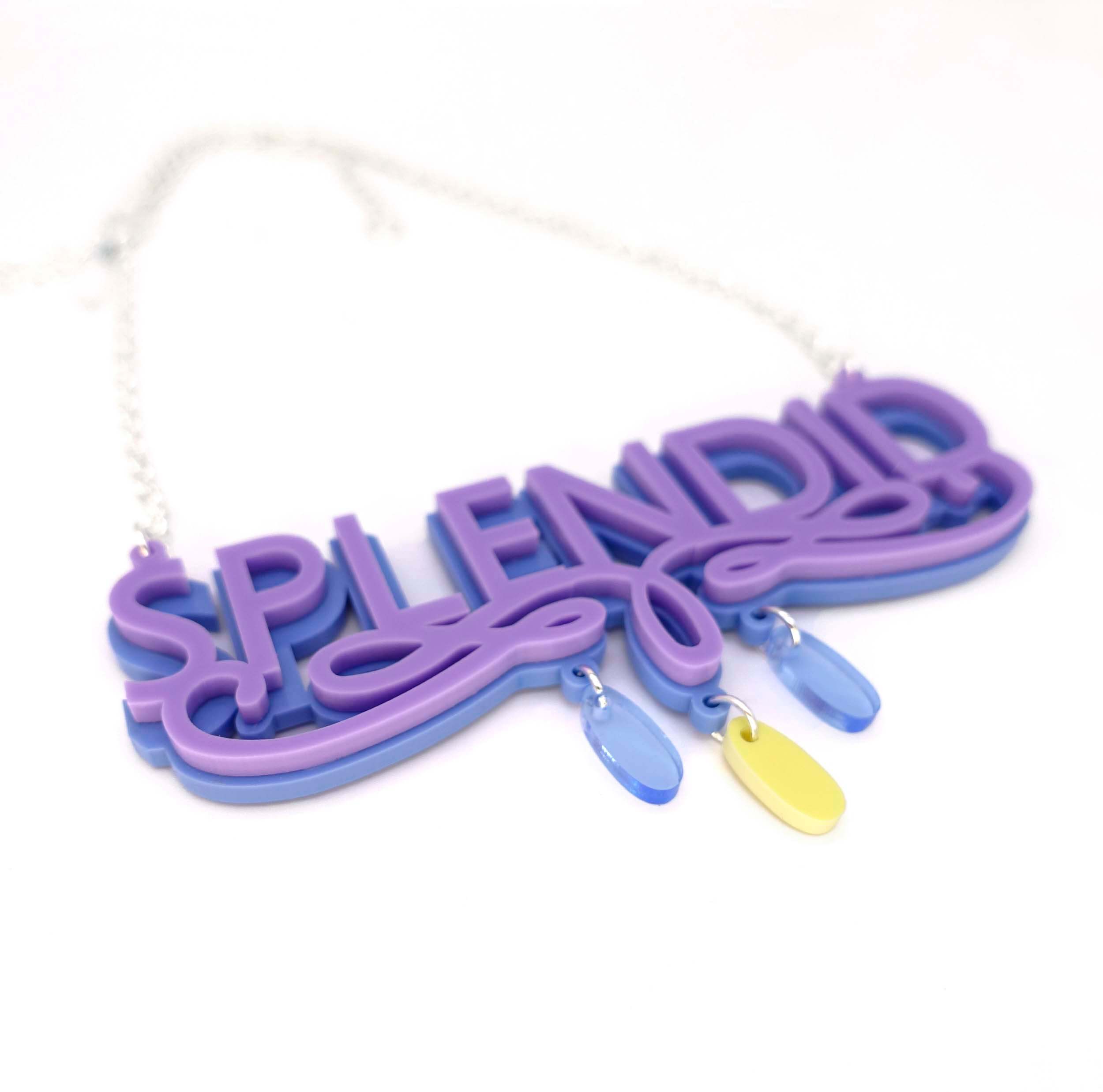 Close up of a Parma violet splendid necklace, designed by Sarah Day for Wear and Resist.
