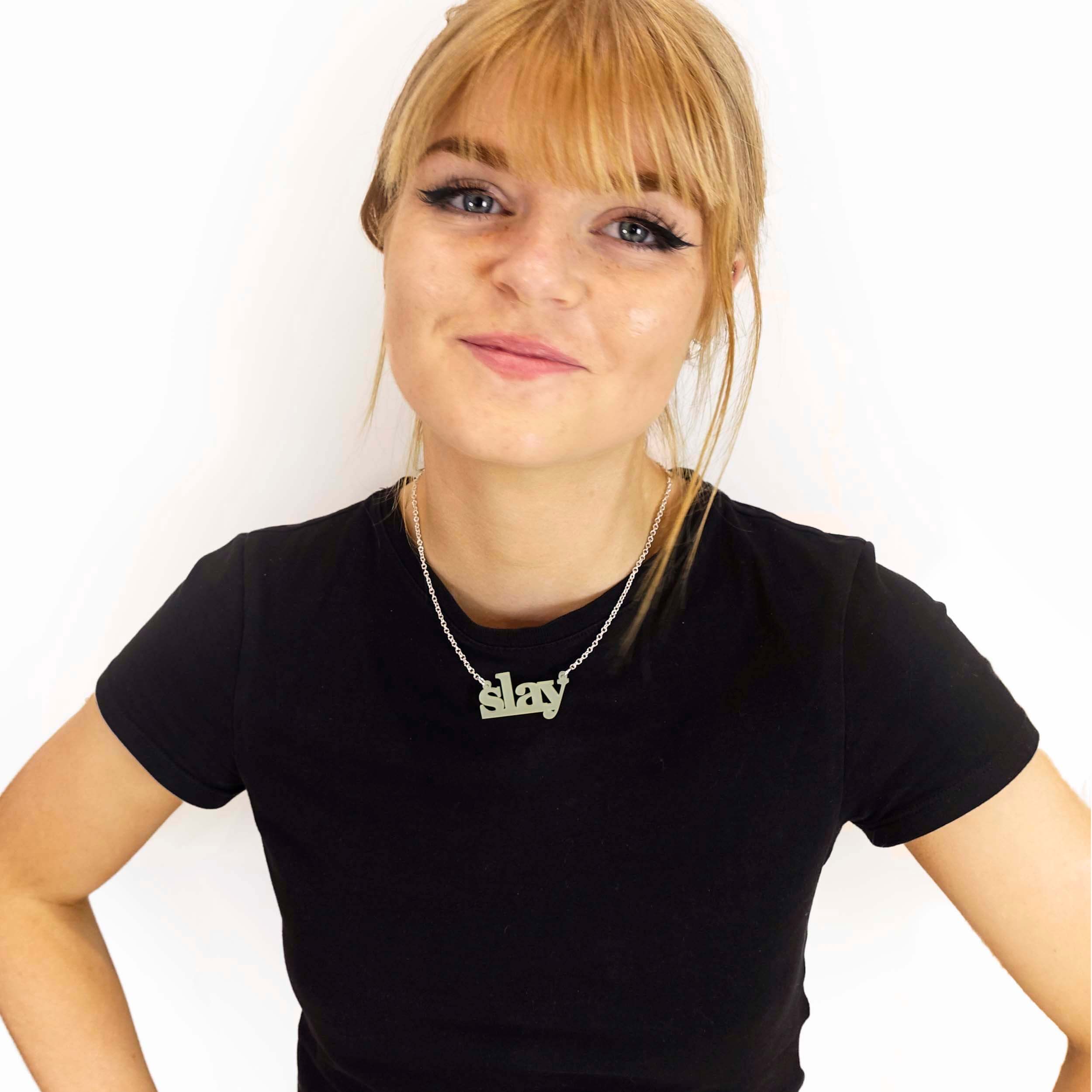 Eliza slays in a Uranium yellow Slay necklace.
