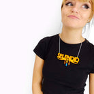 Eliza wears a sunflower yellow and orange Splendid necklace.