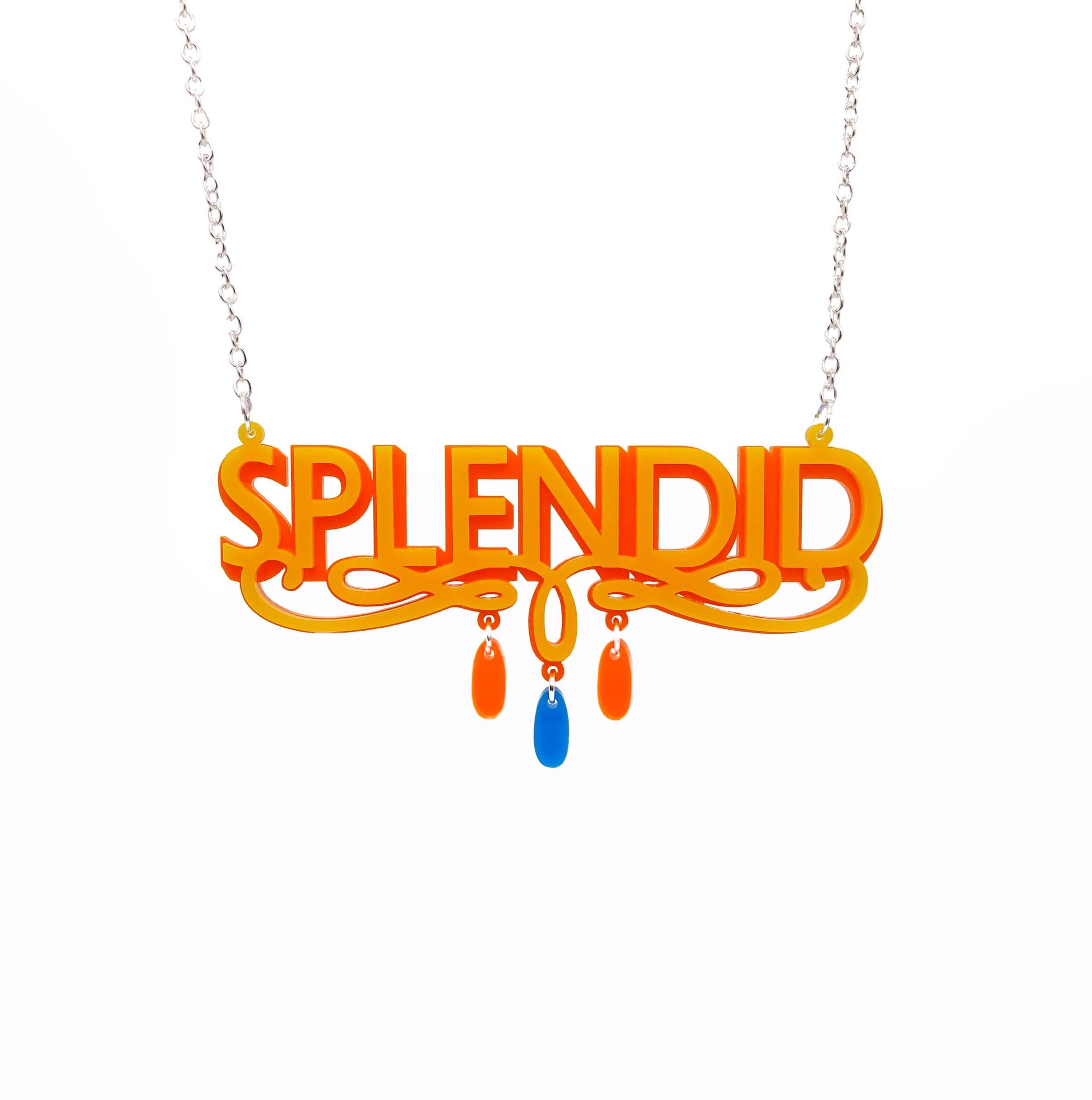 Sunflower yellow and orange Splendid necklace shown hanging against a white background.