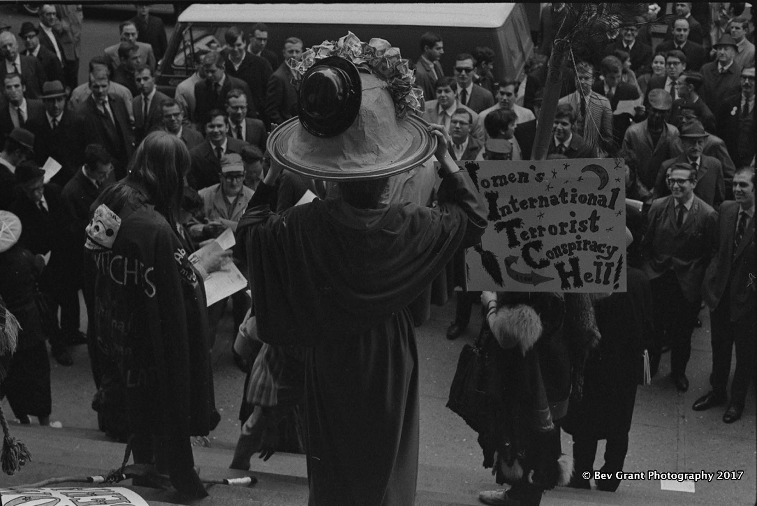 Bev Grant's photograph of WITCHES gathered to protest on Wall Street. 