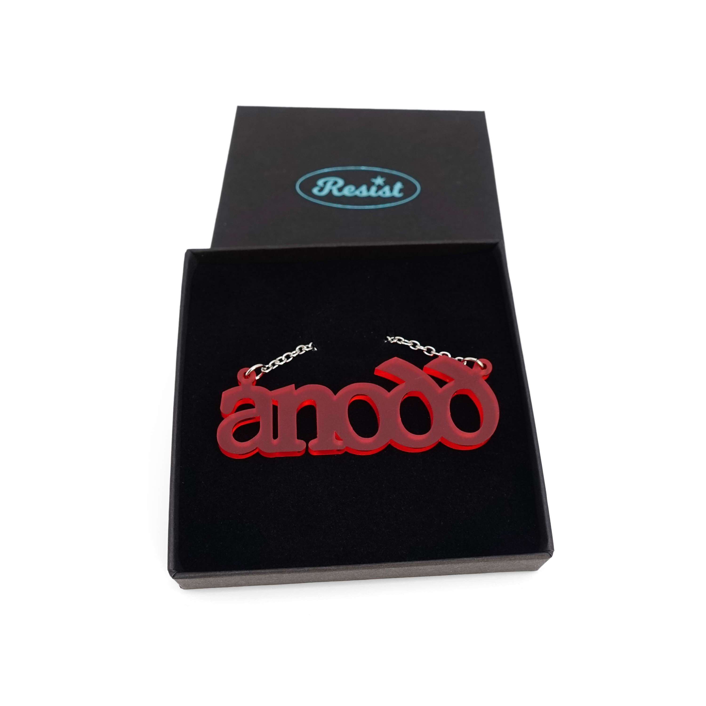 Anodd necklace for Welsh difficult women in chilli frost, shown in a Wear and Resist gift box. 