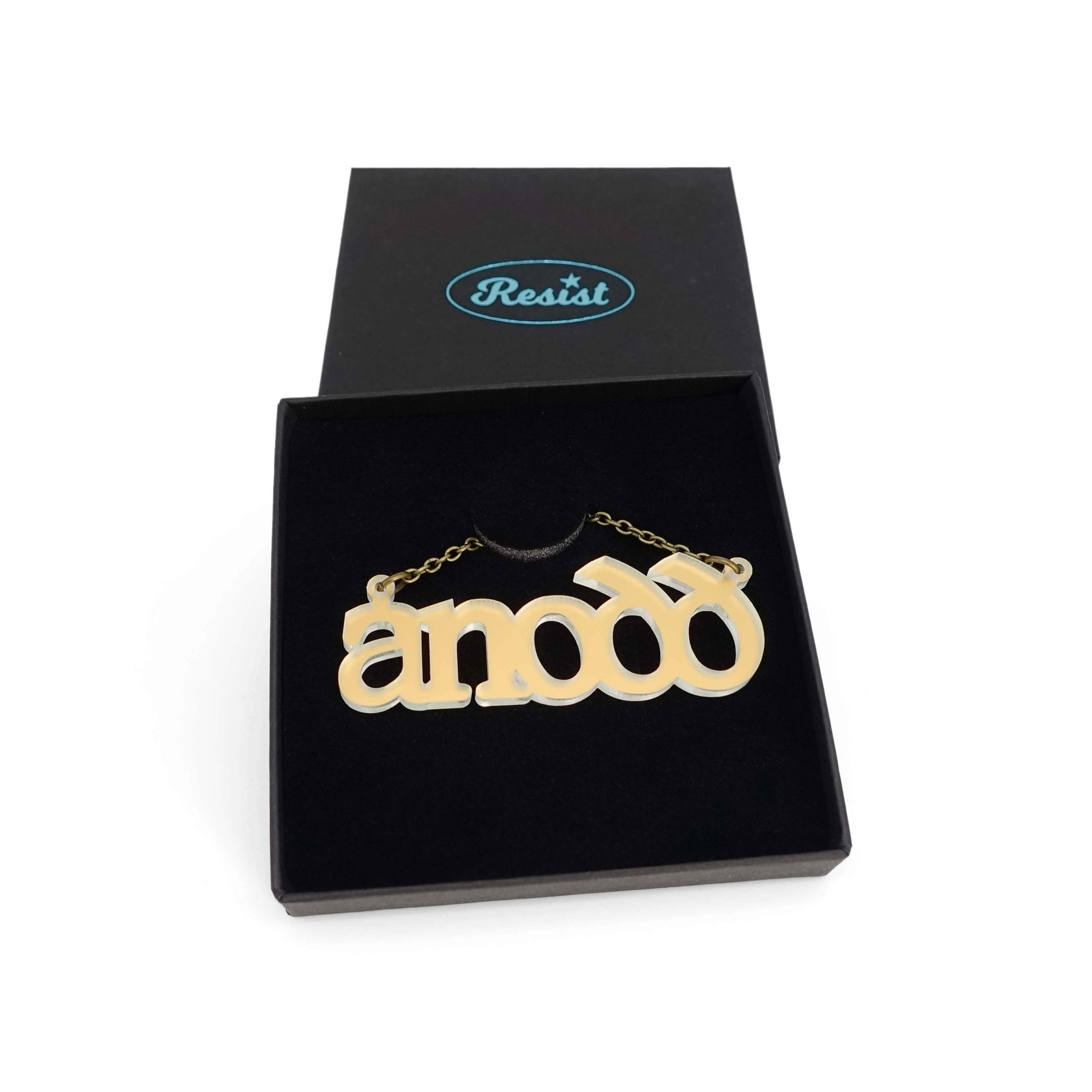 Anodd necklace for Welsh difficult women in matte iridescent, shown in a Wear and Resist gift box. 