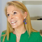 Sarah Day founder of Wear and Resist wears the Bluebell earrings.