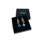 Dreams and Stars earrings from the Brontë Collection, designed by Sarah Day in collaboration with the Brontë Parsonage Museum. Shown in a Wear and Resist gift box. 