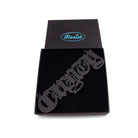 Big C*nty necklace in matte black, shown in a Wear & Resist gift box.