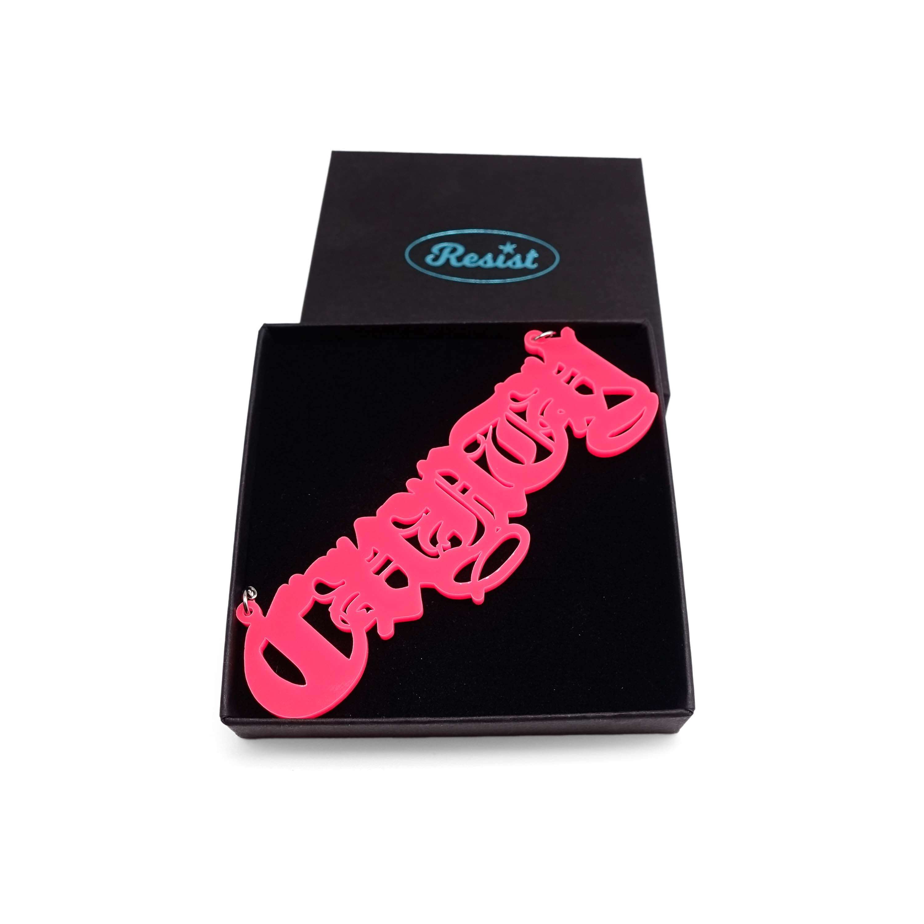 Big C*nty necklace in hot pink, shown in a Wear & Resist gift box. 