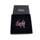 Little CUNTY necklace in matte cassis shown in a Wear & Resist gift box. 