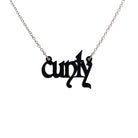 Little CUNTY necklace in matte black shown hanging on a stainless steel chain. 