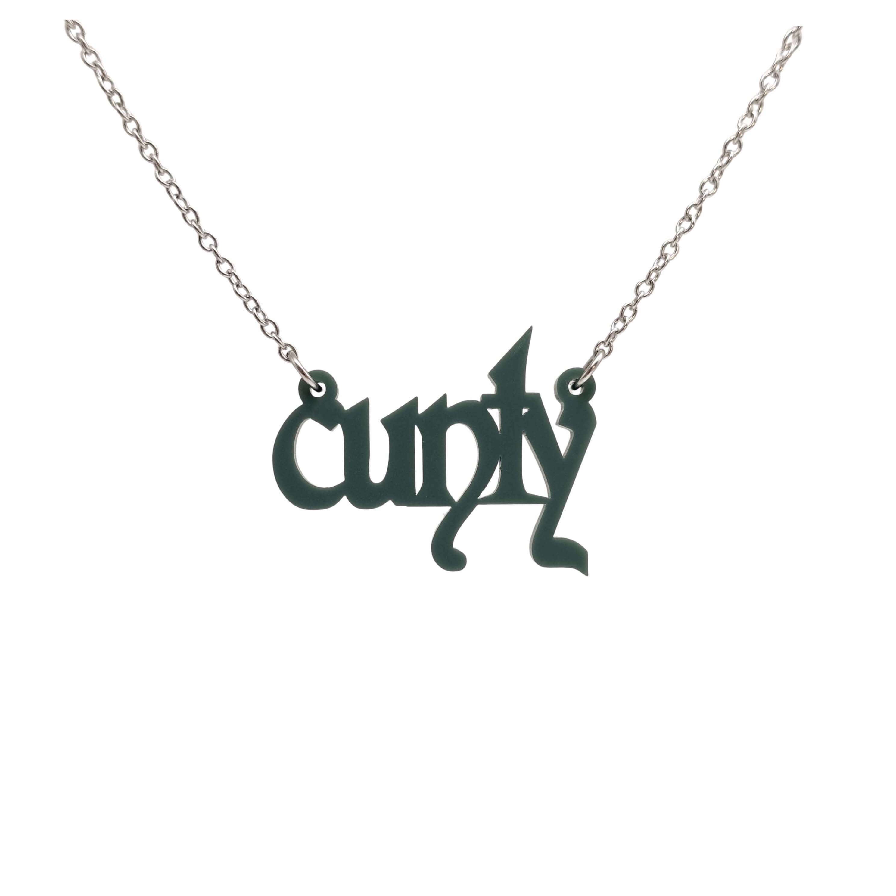 Little CUNTY necklace in matte moss shown hanging on a stainless steel chain. 