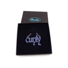 Little CUNTY necklace in matte navy shown in a Wear & Resist gift box. 