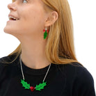 Eliza wears the Holly necklace with matching Delicate Holly earrings.