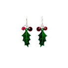 Delicate Holly earrings shown hanging against a white background. 