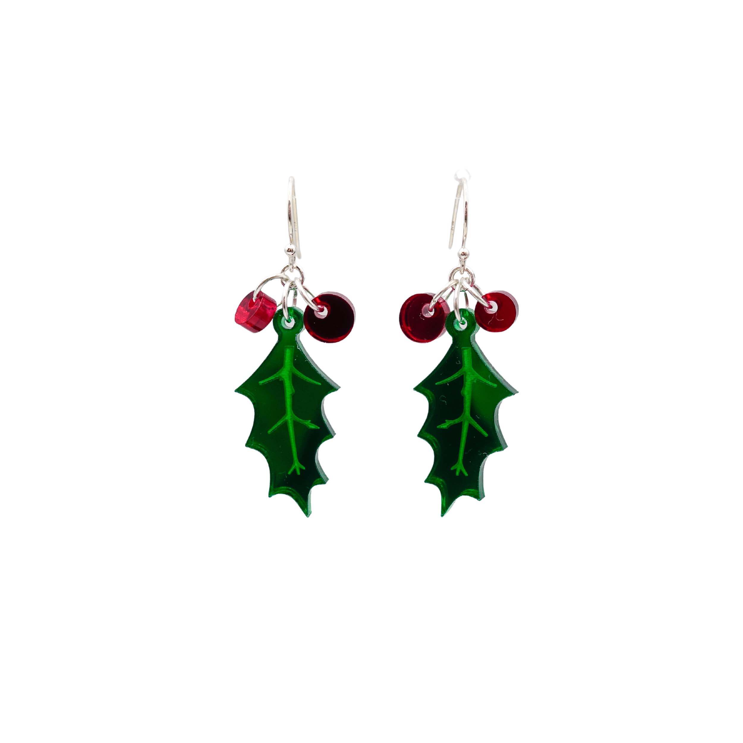 Delicate Holly earrings shown hanging against a white background. 