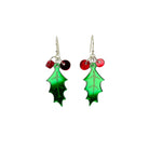 Delicate Holly earrings shown hanging against a white background with the light reflecting off the mirror. 