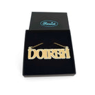 DOIRBH Gaelige necklace for Irish difficult women in matte iridescent, shown in a Wear & Resist gift box. 