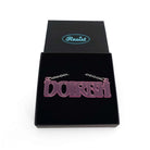 DOIRBH Gaelige necklace for Irish difficult women in pink frost, shown in a Wear & Resist gift box. 