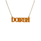 DOIRBH Gaelige necklace for Irish difficult women in cider frost, shown hanging on an antique gold chain. 