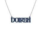 DOIRBH Gaelige necklace for Irish difficult women in slate, shown hanging on a stainless steel chain. 