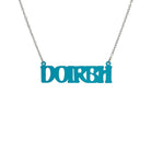 DOIRBH Gaelige necklace for Irish difficult women in teal frost, shown hanging on a stainless steel chain. 