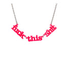 F*ck this Sh*t necklace in hot pink shown hanging on a stainless steel chain against a white background.