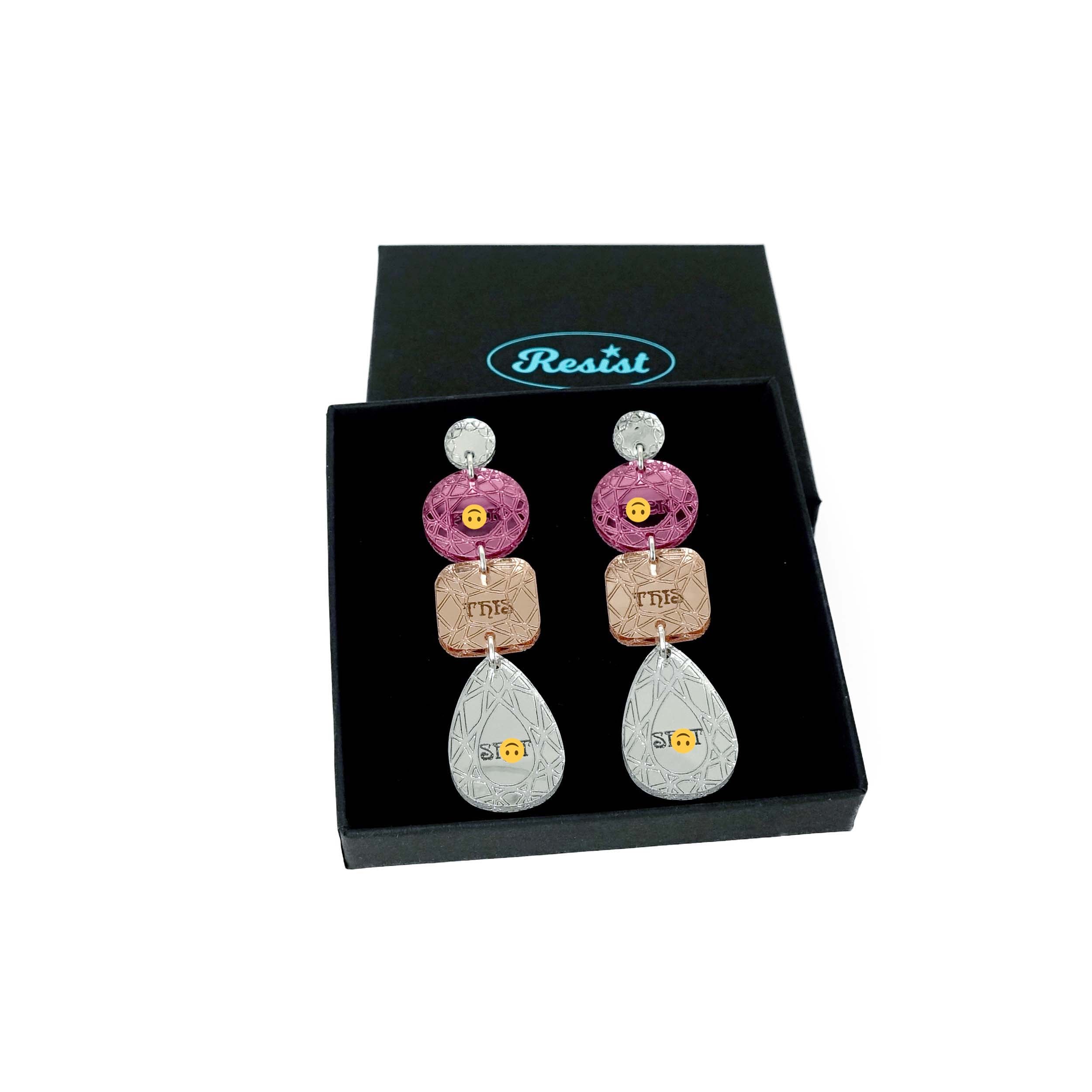 Sweary austerity jewel earrings in pink, rose gold and silver shown in a Wear and Resist gift box. 