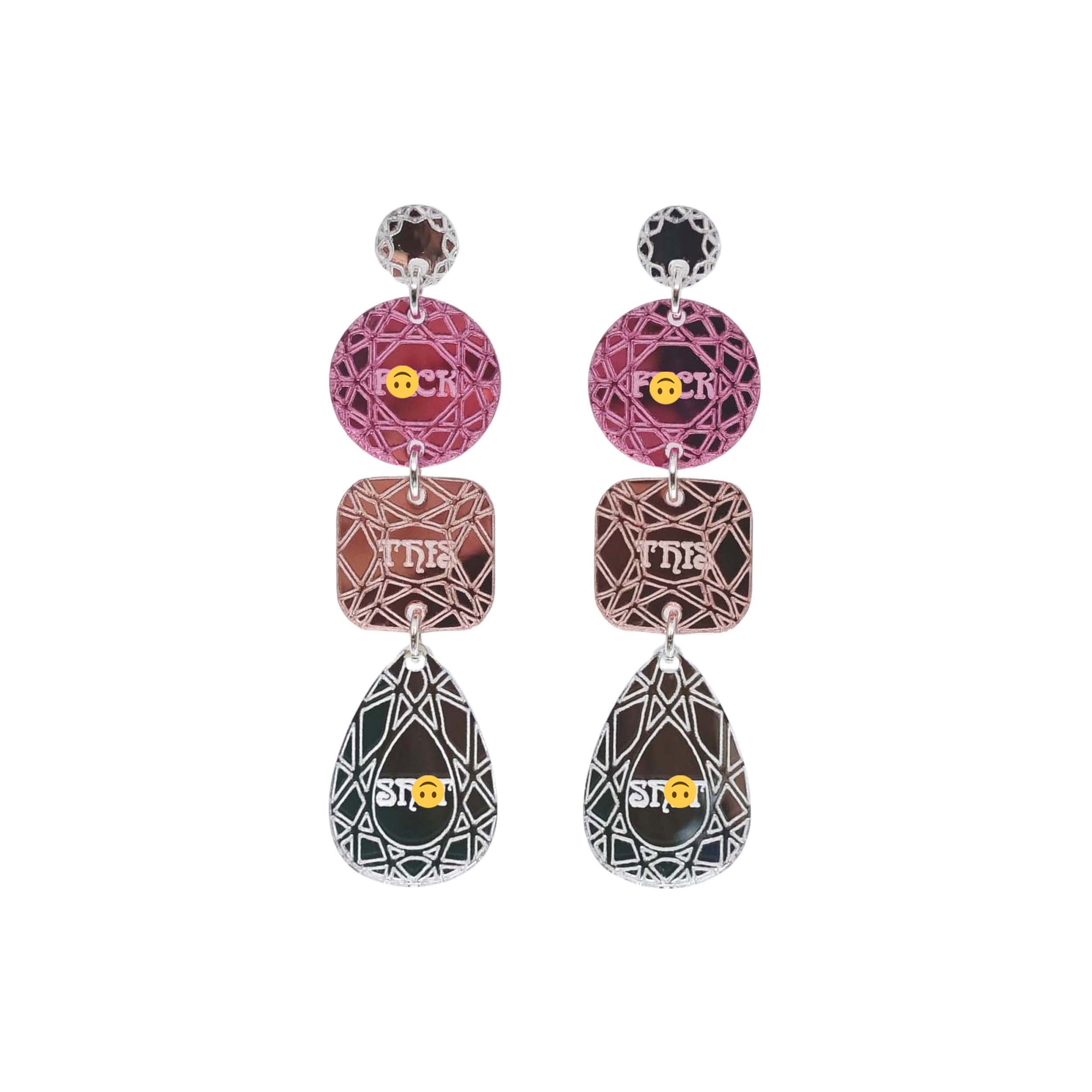 Sweary austerity jewel earrings in pink, rose gold and silver shown hanging against white background. 