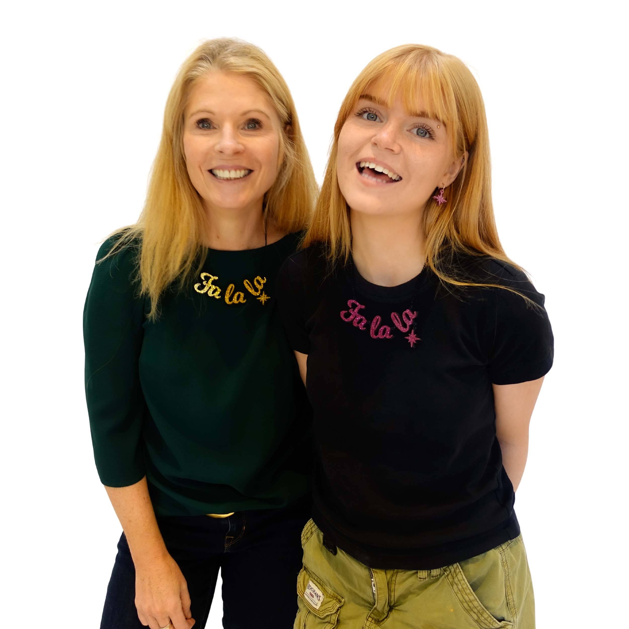 Sarah Day, founder of Wear and Resist, and her daughter, Eliza, wearing Fa La La statement necklaces in ultra gold and hot pink. 