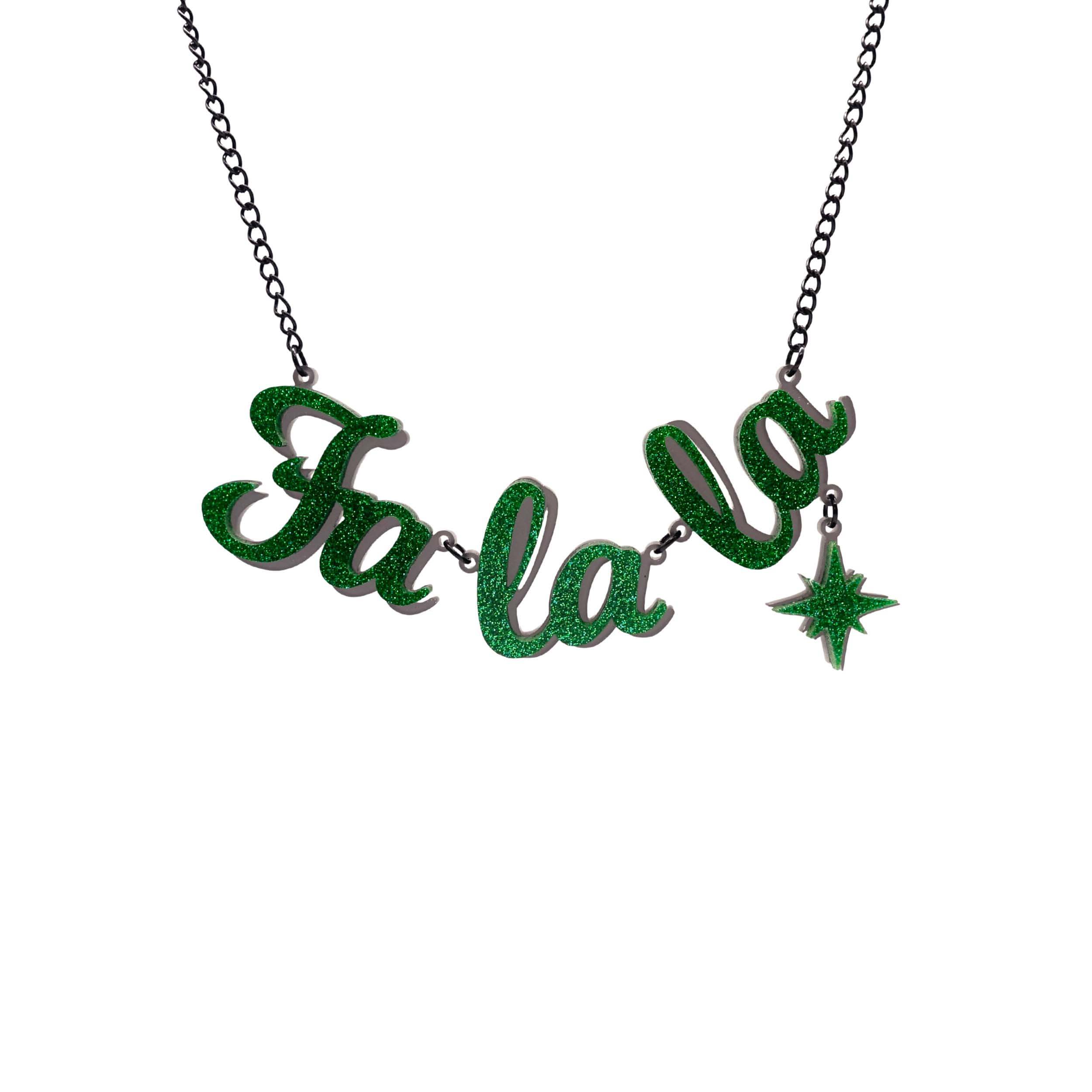 Fa La LA necklace in green glitter, with hanging vintage star, shown hanging against a white background.