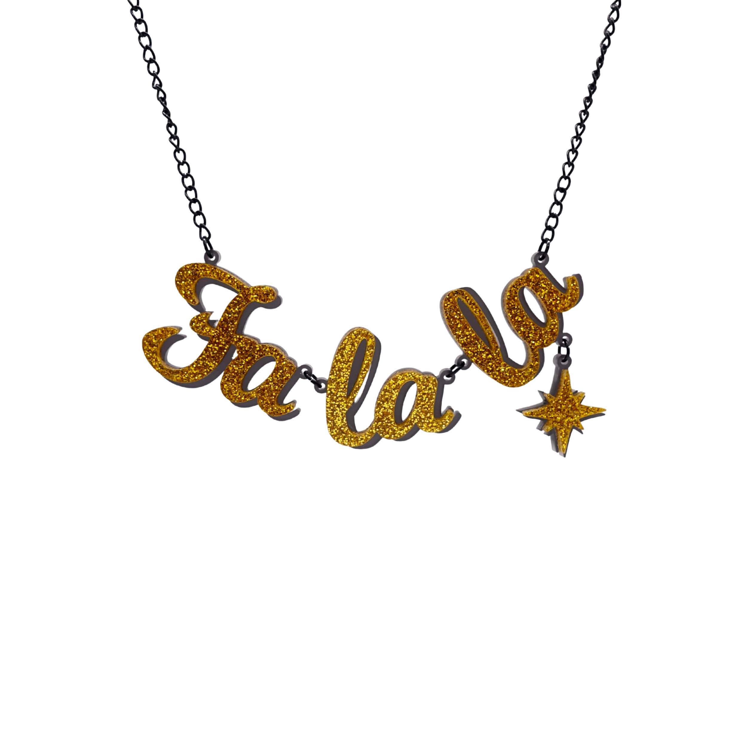 Fa La LA necklace in ultra gold glitter,  with hanging vintage star, shown hanging against a white background.