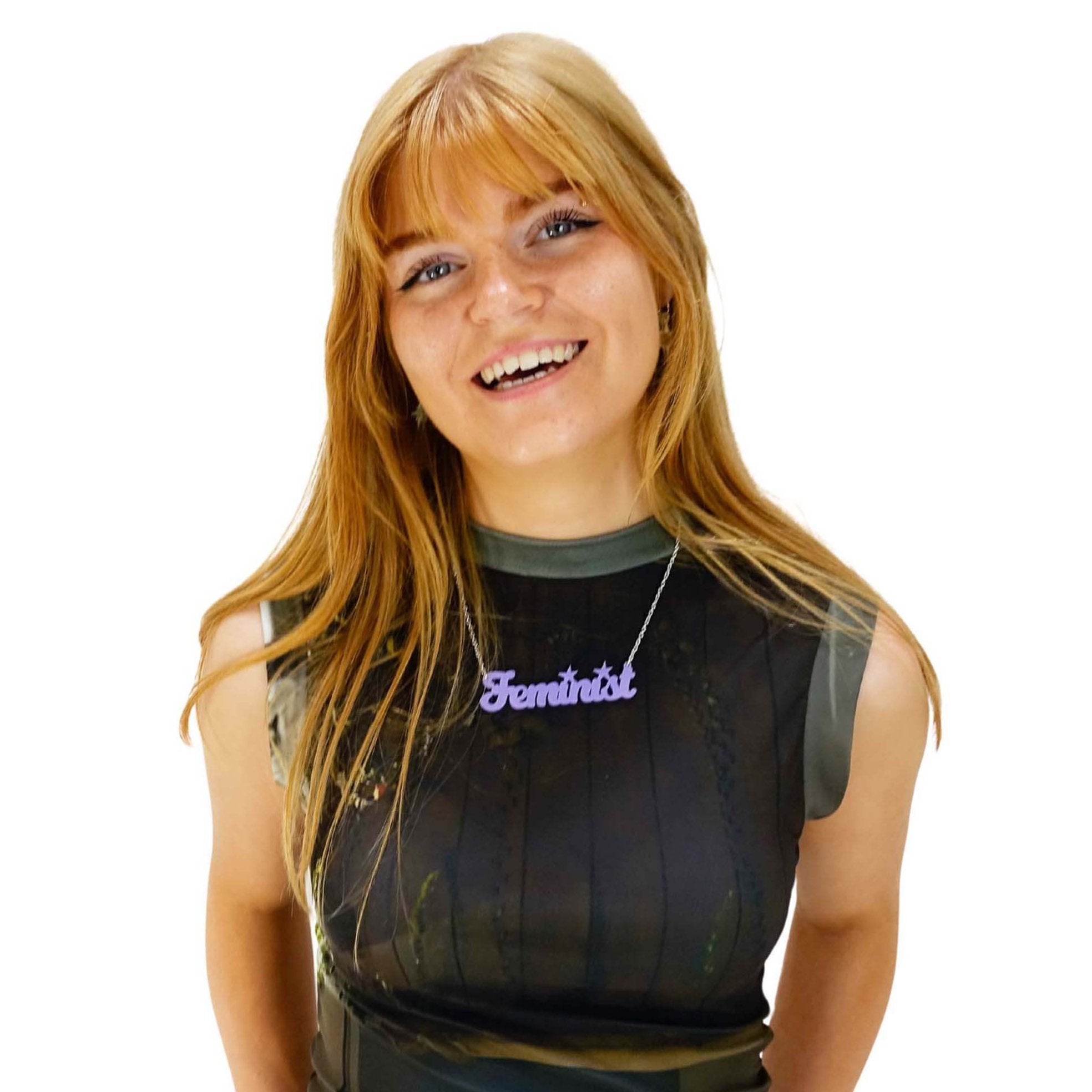 Eliza wears a script font Feminist necklace in parma violet.  