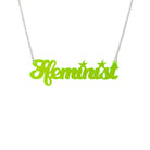 Welsh Ffeminist necklace in neon lime, shown hanging against a white background. 