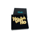 Ho F*cking Ho necklace in gold mirror, shown in a Wear and Resist gift box. 