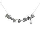 Merry & Bright necklace in silver glitter on a silver chain, shown hanging against a white background. 