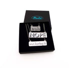 Nah, Nope and Not Having It necklaces in silver mirror on a stainless steel chain shown in a Wear and Resist gift box. 
