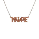 Nope necklace with Rebel Alliance symbol in pink fizz glitter hanging on a stainless steel chain against a white background. 