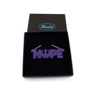 Nope necklace with Rebel Alliance symbol in violet frost, shown in a Wear and Resist gift box. 