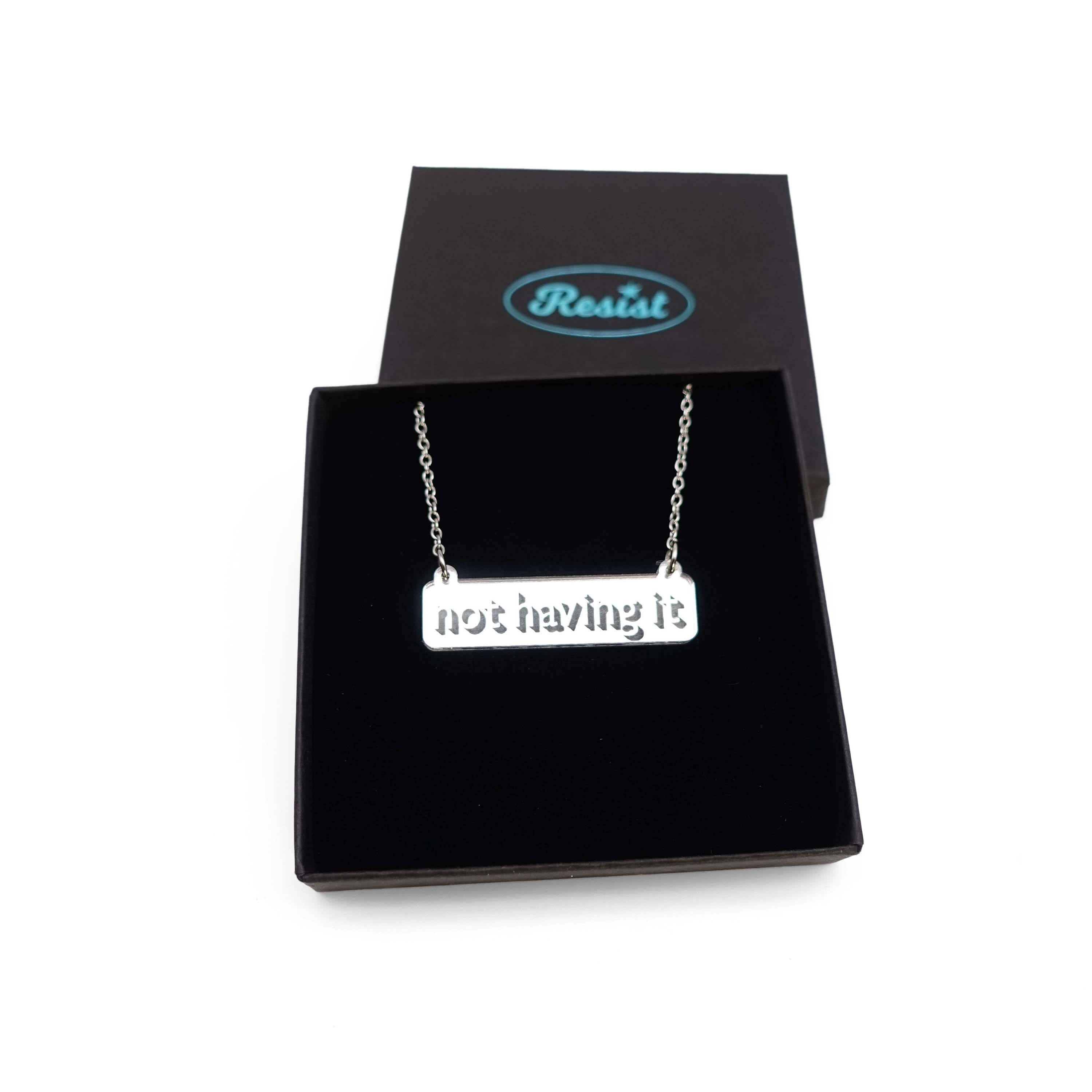 Not Having It necklace in silver mirror on a stainless steel chain shown in a Wear and Resist gift box. 