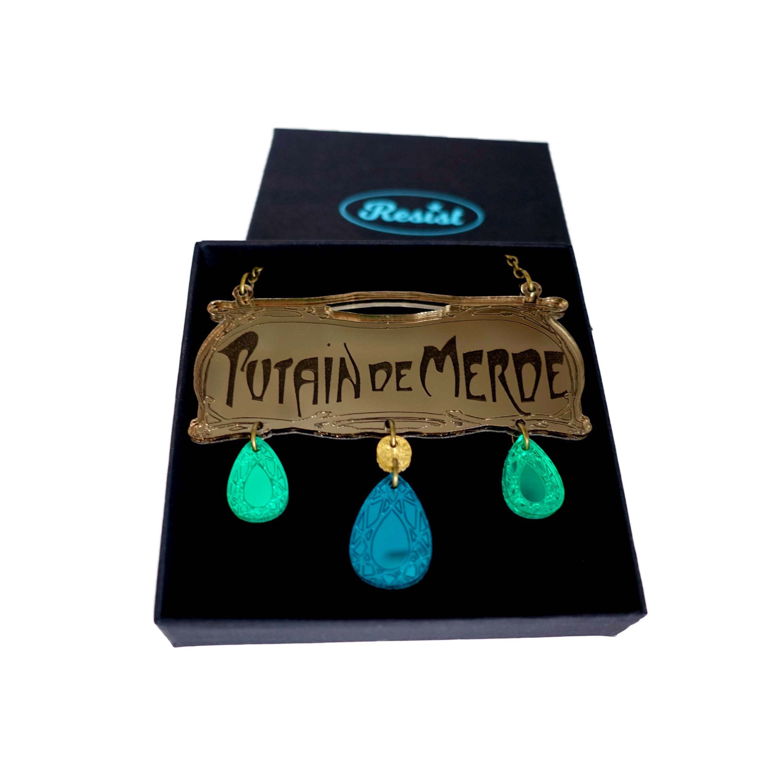 French sweary necklace in the style of the Paris Metro. P*tain de m*rde! Shown in a Wear and Resist gift box.